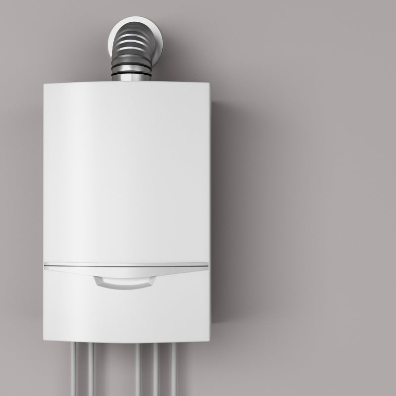 Minimalist wall-mounted gas hot water system with vent pipe.