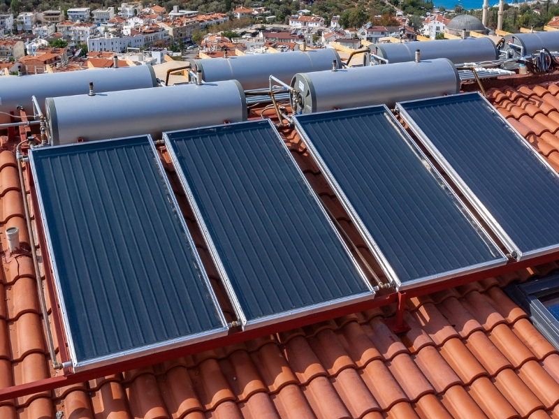 Rooftop Solar Hot Water Installation with multiple flat plate solar collectors